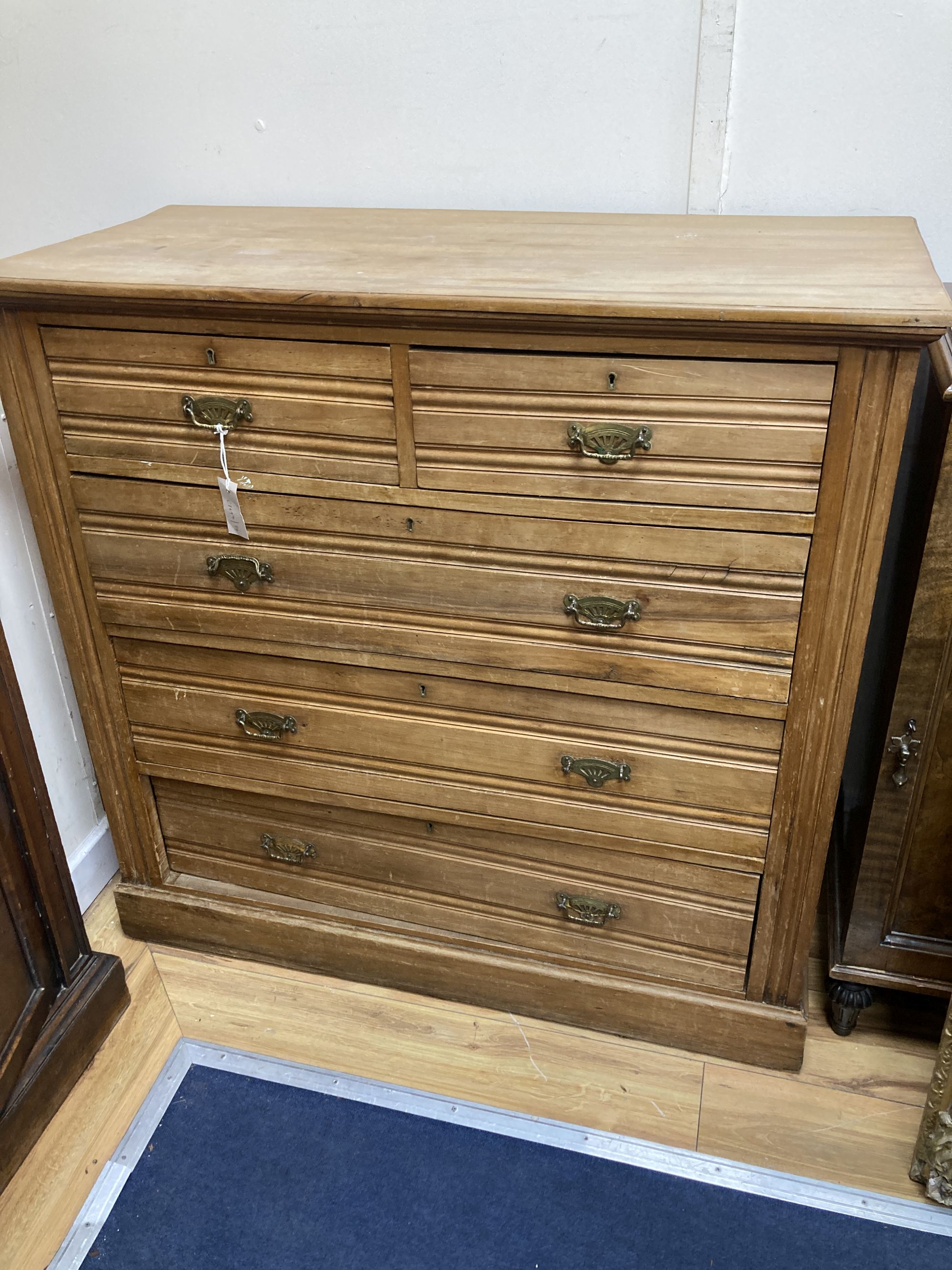 A late Victorian satin walnut chest of drawers, width 102cm, depth 47cm, height 100cm